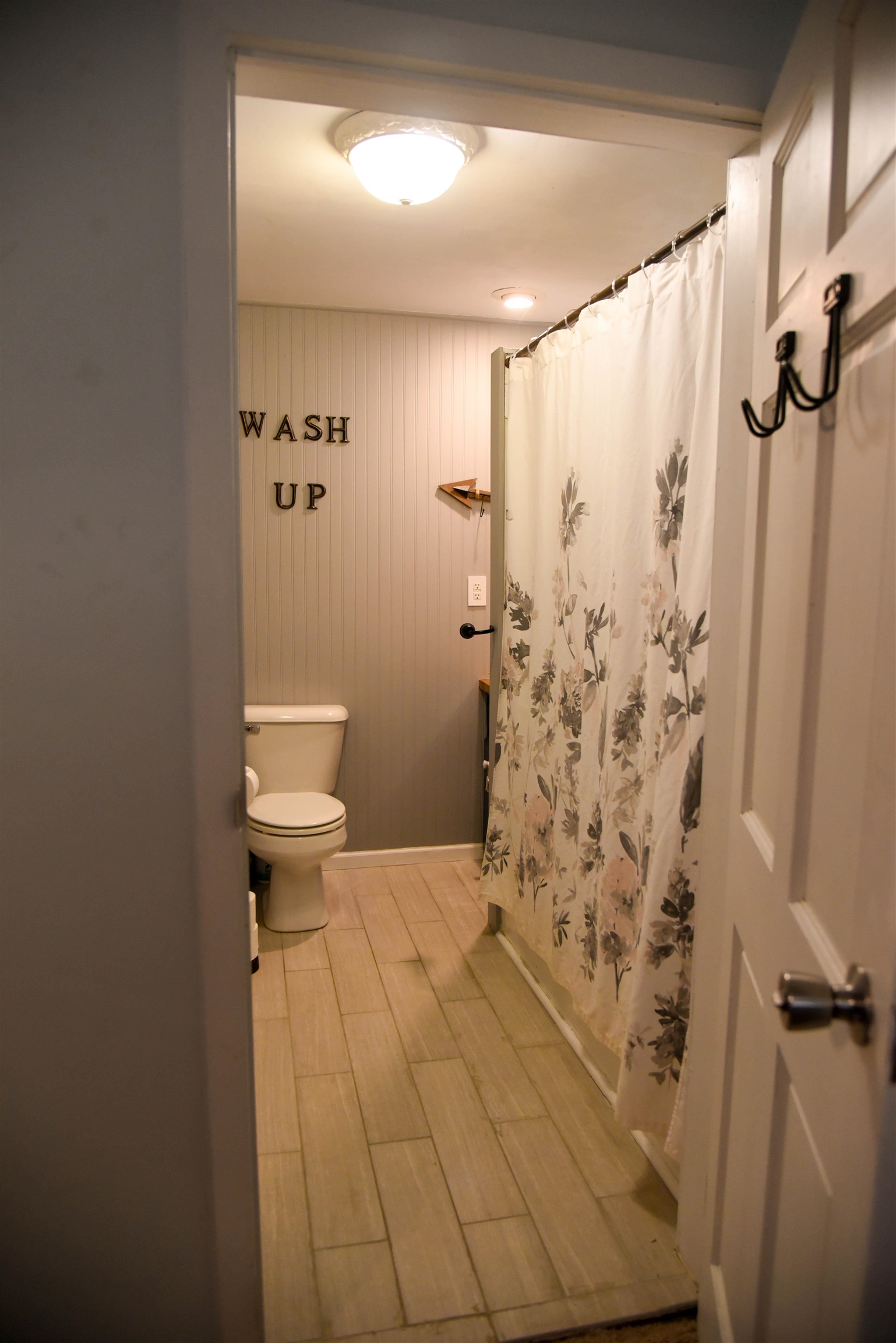 120 North Booth Street Dubuque, IA 52001 - Photo 17 of 26 a bathroom with a shower and a toilet