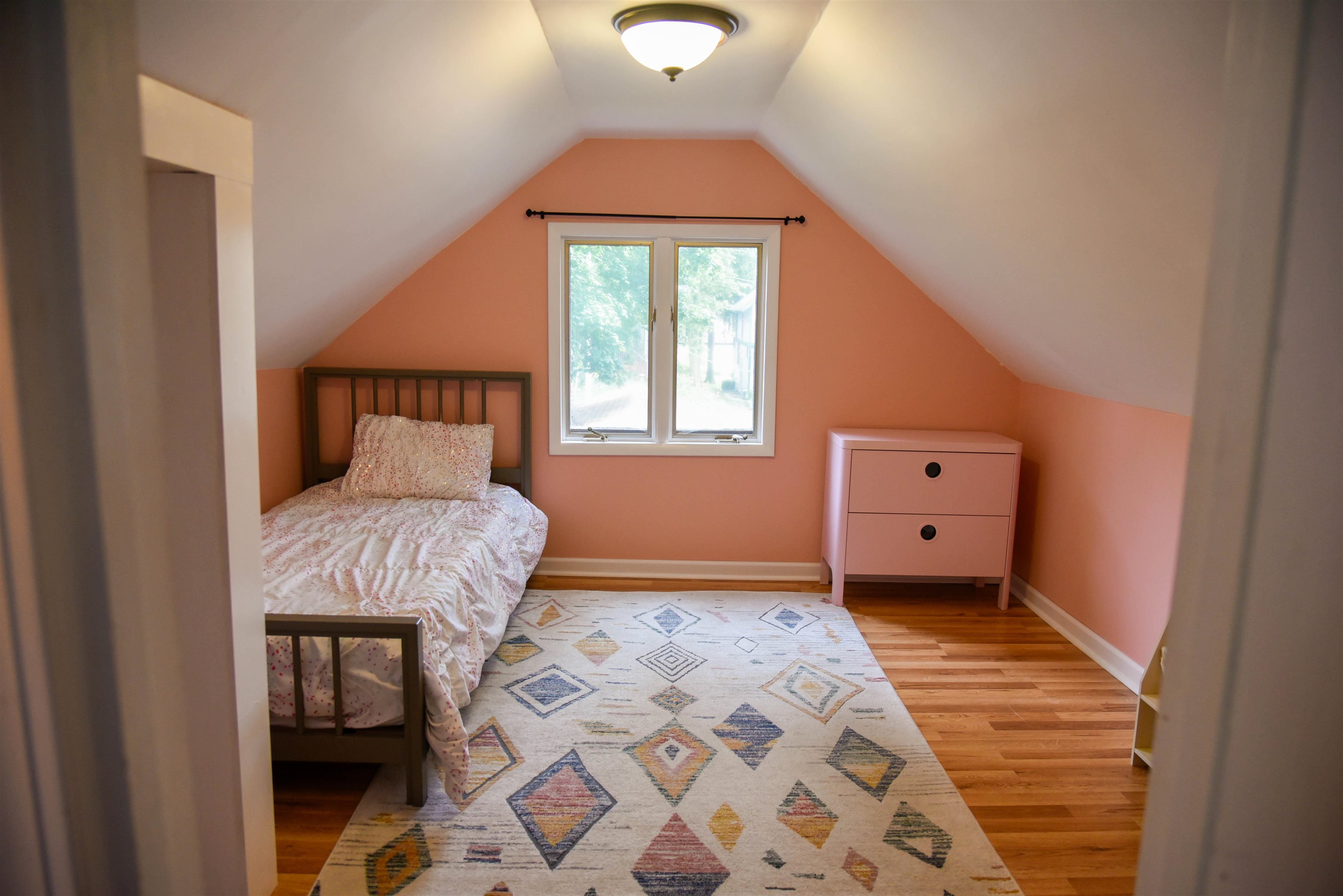 120 North Booth Street Dubuque, IA 52001 - Photo 25 of 26 a bedroom with a bed and a window