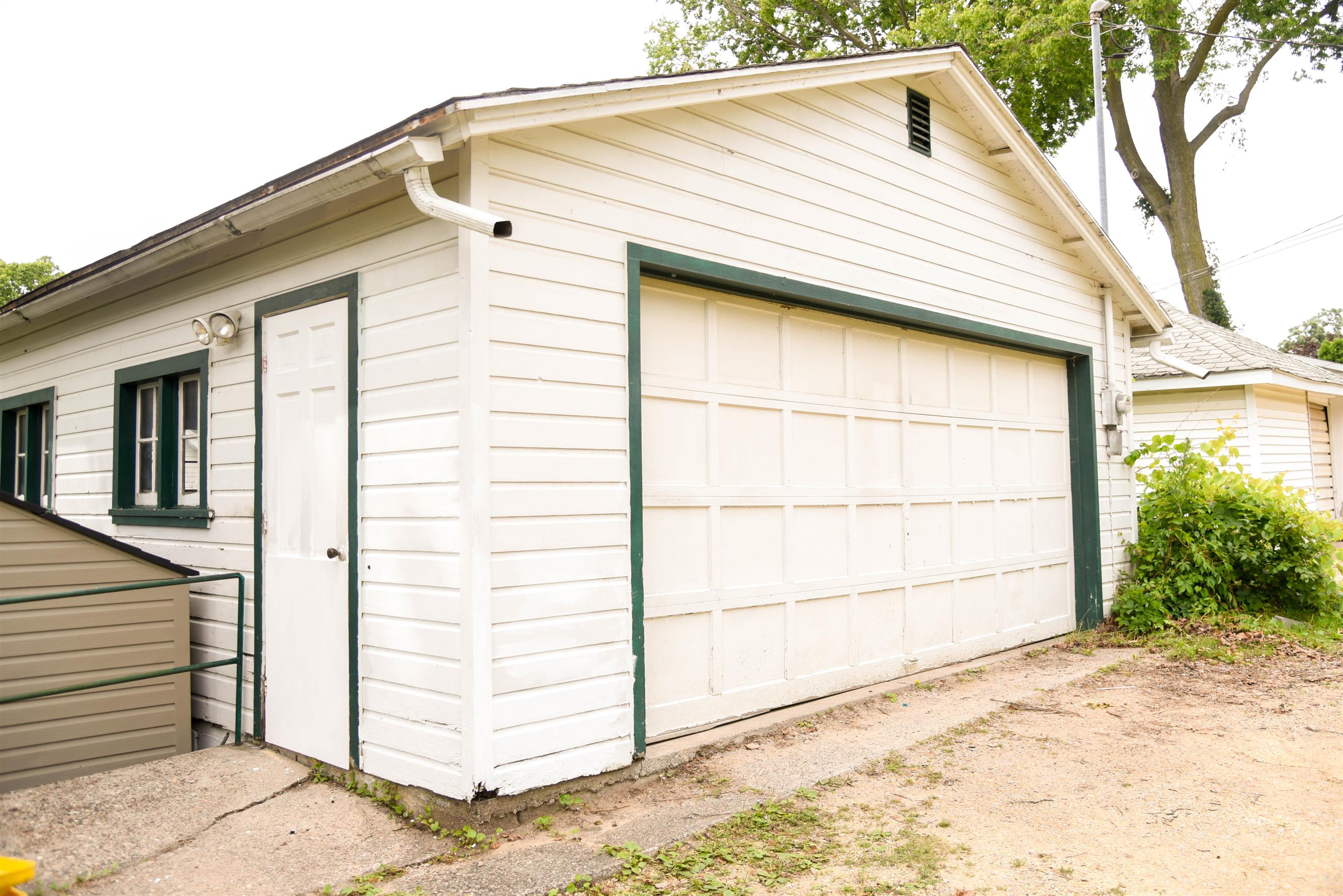 120 North Booth Street Dubuque, IA 52001 - Photo 4 of 26 a view of a house with a garage