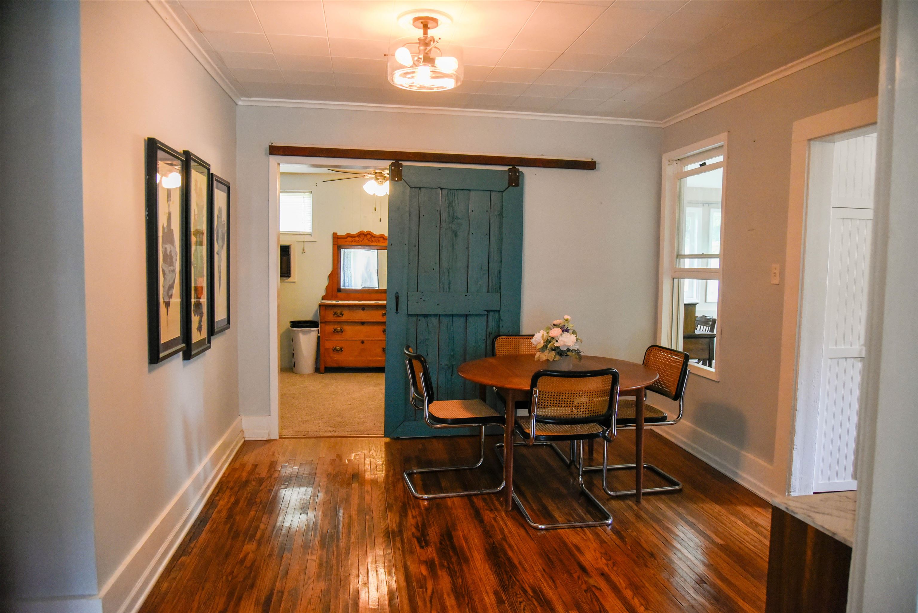 120 North Booth Street Dubuque, IA 52001 - Photo 10 of 26 a dining room with furniture and wooden floor