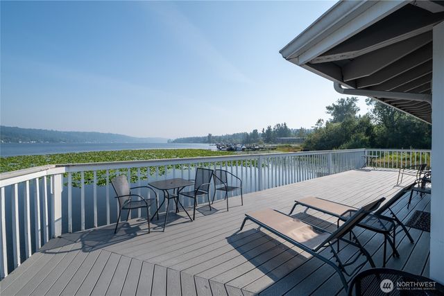 a view of a roof deck with a patio