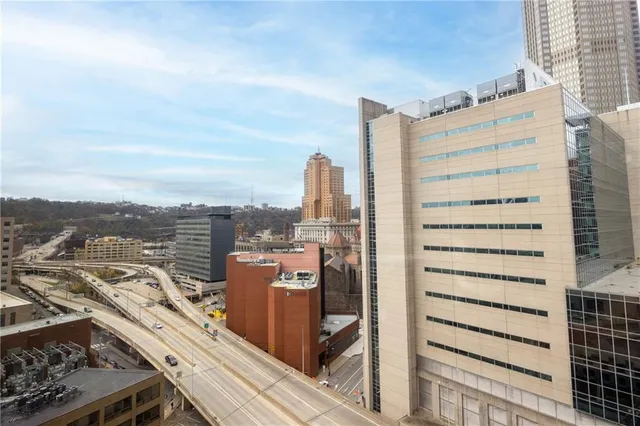 a view of a city with tall buildings