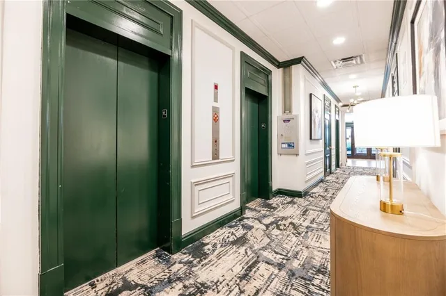 a bedroom with a bed and a sink