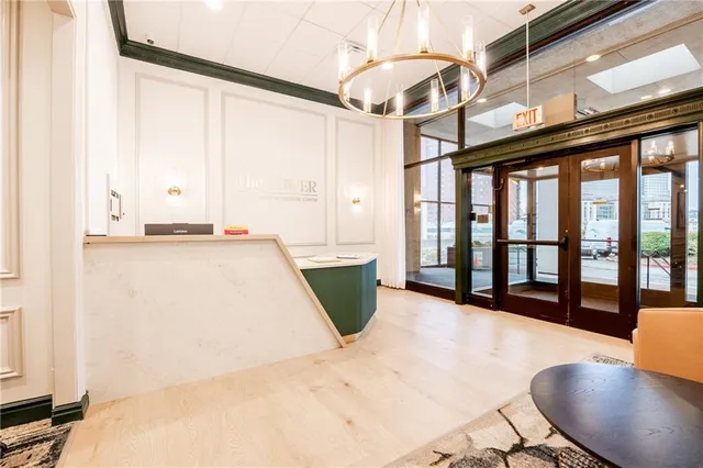 a view of a living room and entry way