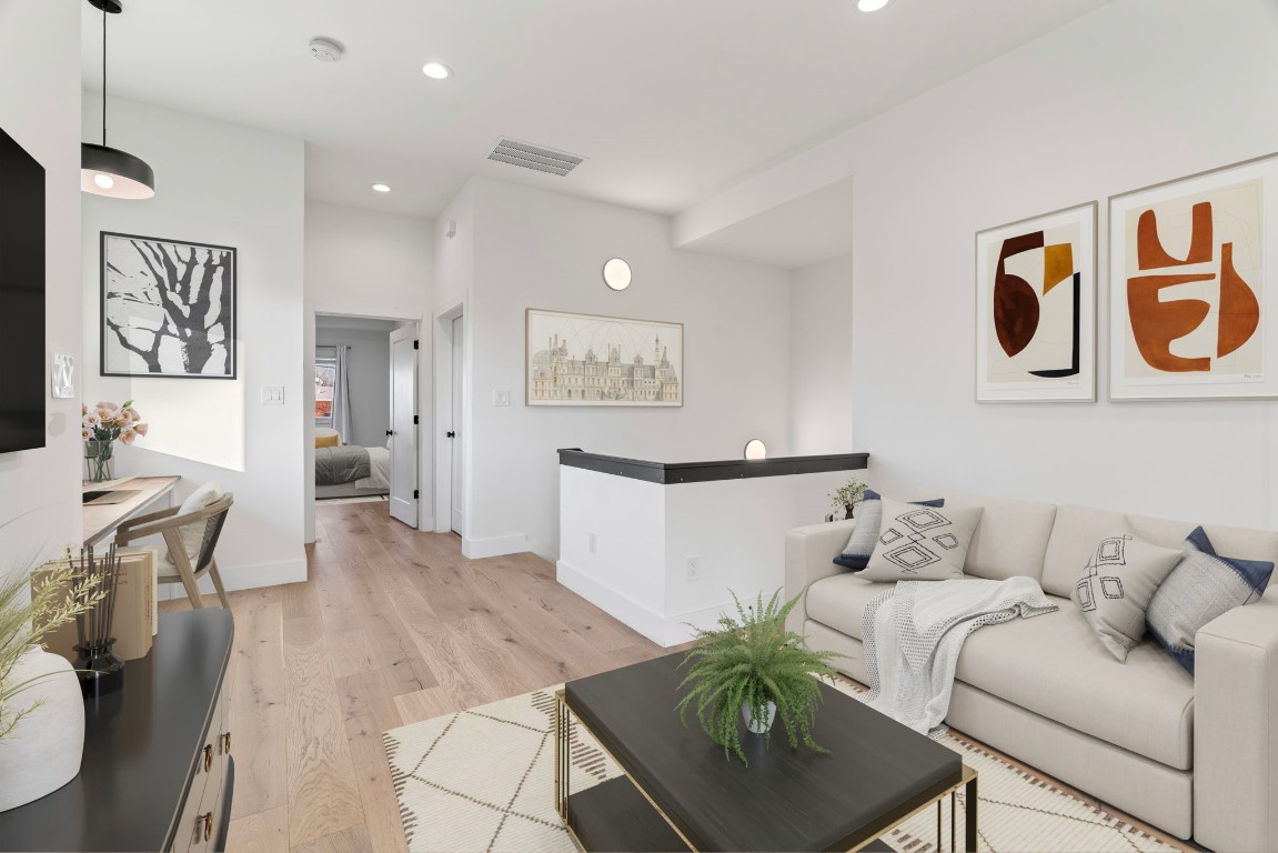 3802 Commerce Street Houston, TX 77003 - Photo 18 of 45 The upstairs living area is a bright, versatile retreat designed for both productivity and relaxation, with an open layout and abundant natural light. Whether used as a media space or home office, it offers comfort and flexibility just minutes from the energy of downtown.