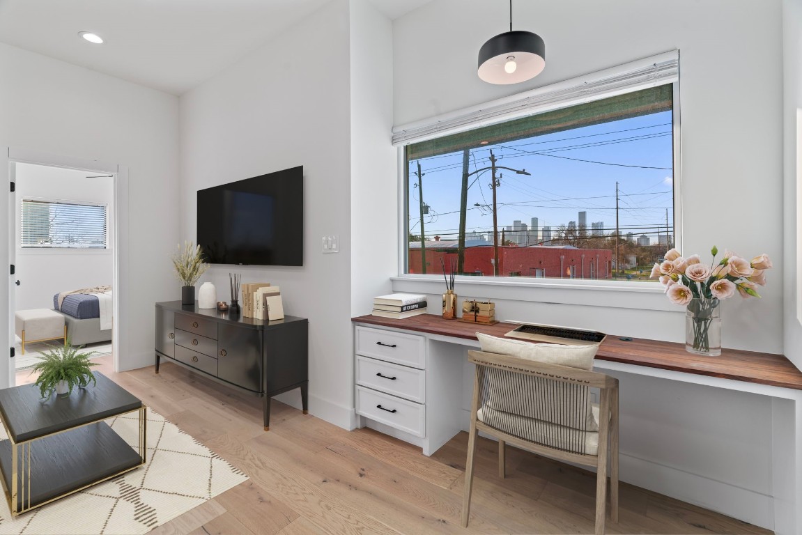 3802 Commerce Street Houston, TX 77003 - Photo 20 of 45 Built-in desk and storage is perfect for working from home, with fantastic views of Downtown Houston.