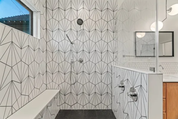 a utility room with cabinets and a stove