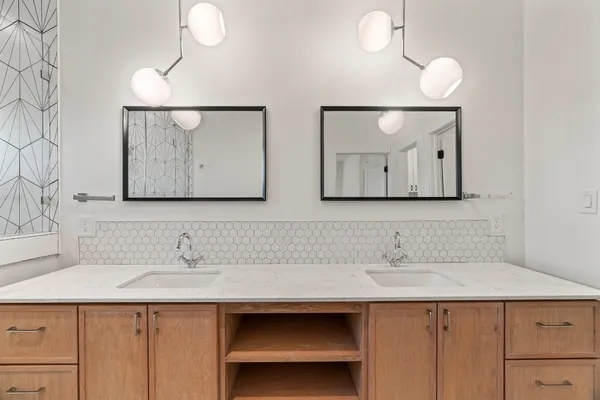 a kitchen with a stove and a cabinets