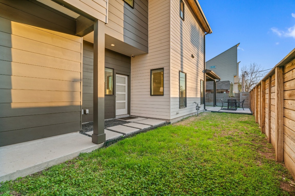 3802 Commerce Street Houston, TX 77003 - Photo 38 of 45 Rare private outdoor space featuring a covered porch and concrete decking. Perfect for entertaining, relaxing, pets, or outdoor gatherings.