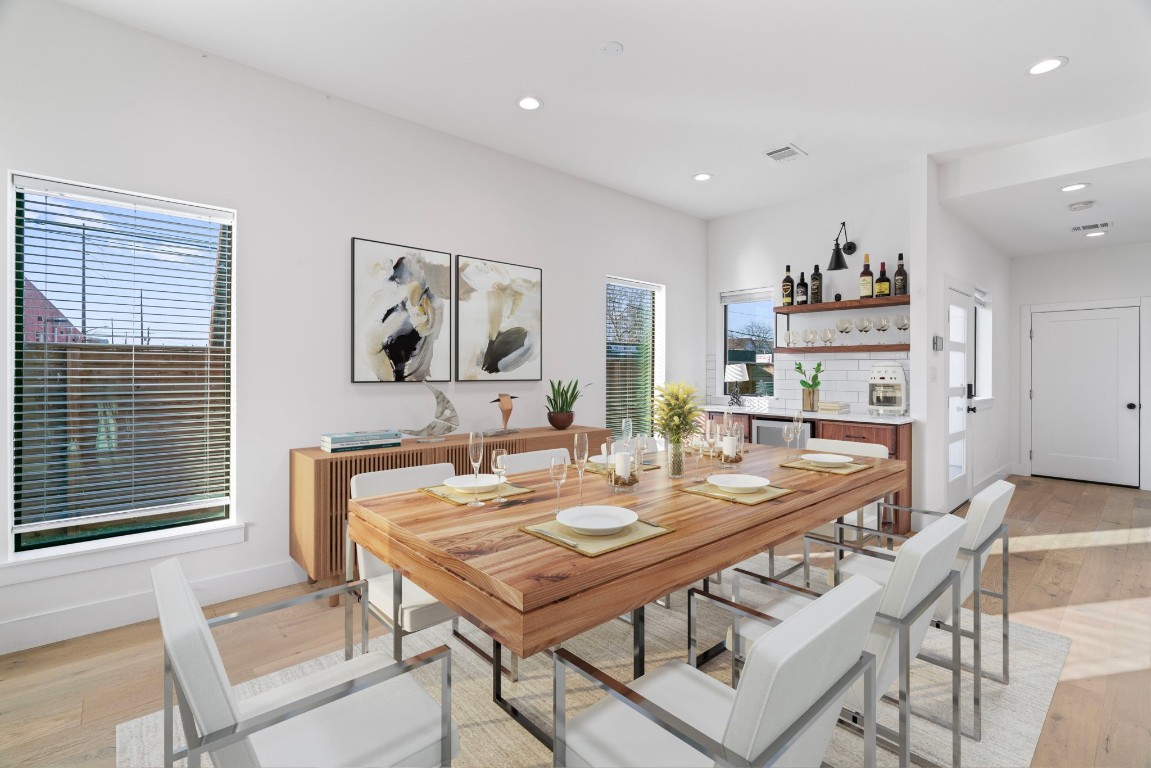 3802 Commerce Street Houston, TX 77003 - Photo 6 of 45 The thoughtfully designed dining space is filled with natural light and perfectly positioned for both casual meals and lively gatherings. Its connection to the kitchen and living areas makes entertaining easy, all while enjoying the convenience of this centrally located home.