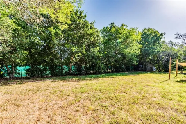 a view of a swimming pool with an outdoor space