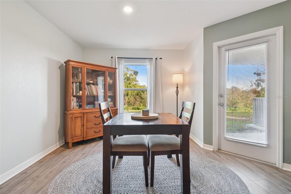 5228 New Friendship Place Tampa, FL 33619 - Photo 12 of 49 a dining room with furniture and window
