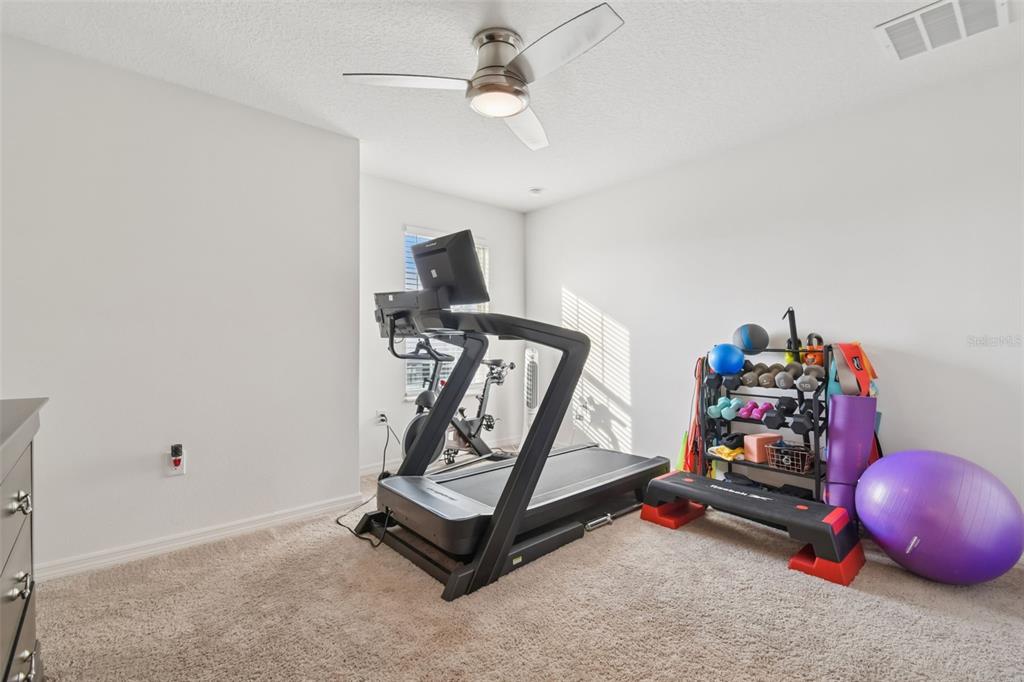 5228 New Friendship Place Tampa, FL 33619 - Photo 22 of 49 a room with gym equipment