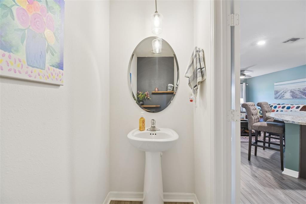 5228 New Friendship Place Tampa, FL 33619 - Photo 28 of 49 a bathroom with a sink and a mirror