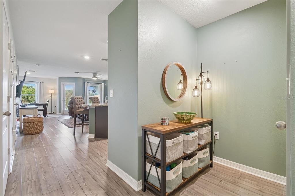 5228 New Friendship Place Tampa, FL 33619 - Photo 3 of 49 a living room with furniture and a wooden floor