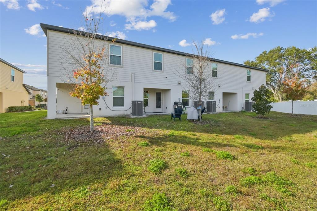 5228 New Friendship Place Tampa, FL 33619 - Photo 32 of 49 a view of a house with backyard and garden