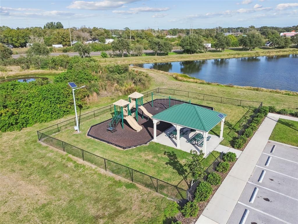 5228 New Friendship Place Tampa, FL 33619 - Photo 38 of 49 an aerial view of a house with a lake view
