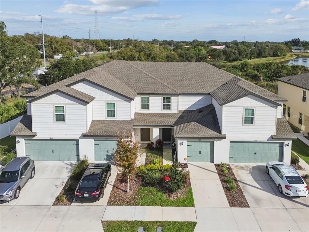 5228 New Friendship Place Tampa, FL 33619 - Photo 46 of 49 a aerial view of a house with a yard