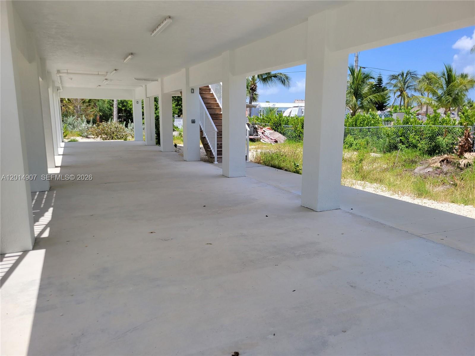 799 Hazel Street, Unit 799 Key Largo, FL 33037 - Photo 13 of 13 a view of a livingroom with furniture and a window