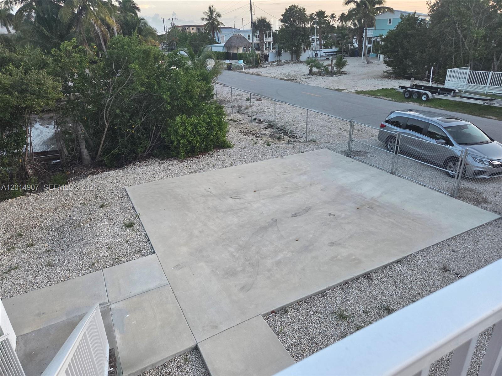 799 Hazel Street, Unit 799 Key Largo, FL 33037 - Photo 3 of 13 a view of a road with an outdoor space