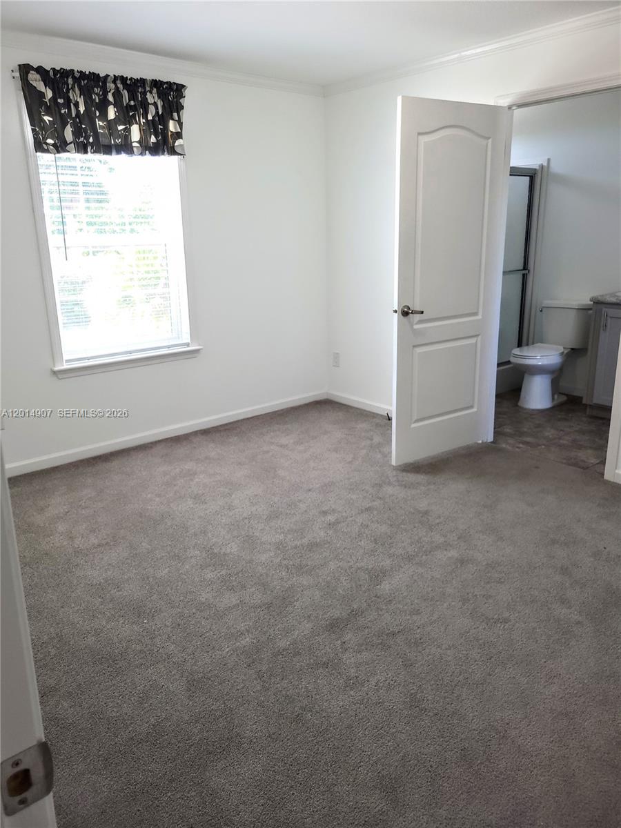 799 Hazel Street, Unit 799 Key Largo, FL 33037 - Photo 7 of 13 an empty room with a window