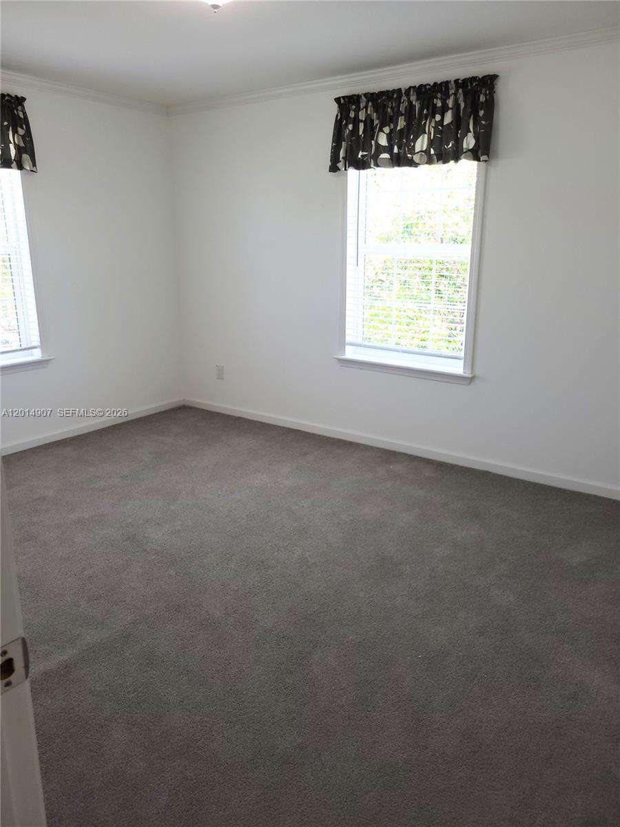 799 Hazel Street, Unit 799 Key Largo, FL 33037 - Photo 9 of 13 an empty room with a window