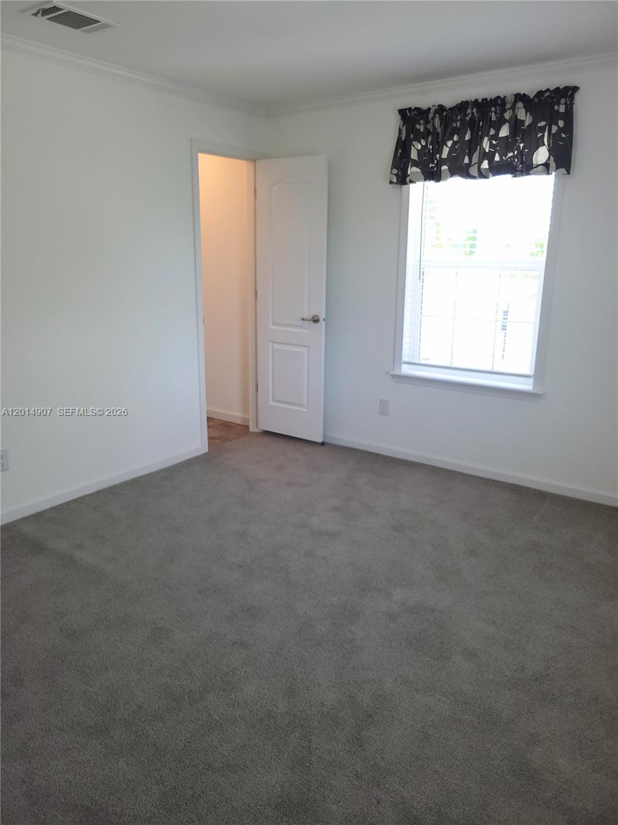 799 Hazel Street, Unit 799 Key Largo, FL 33037 - Photo 10 of 13 an empty room with a window