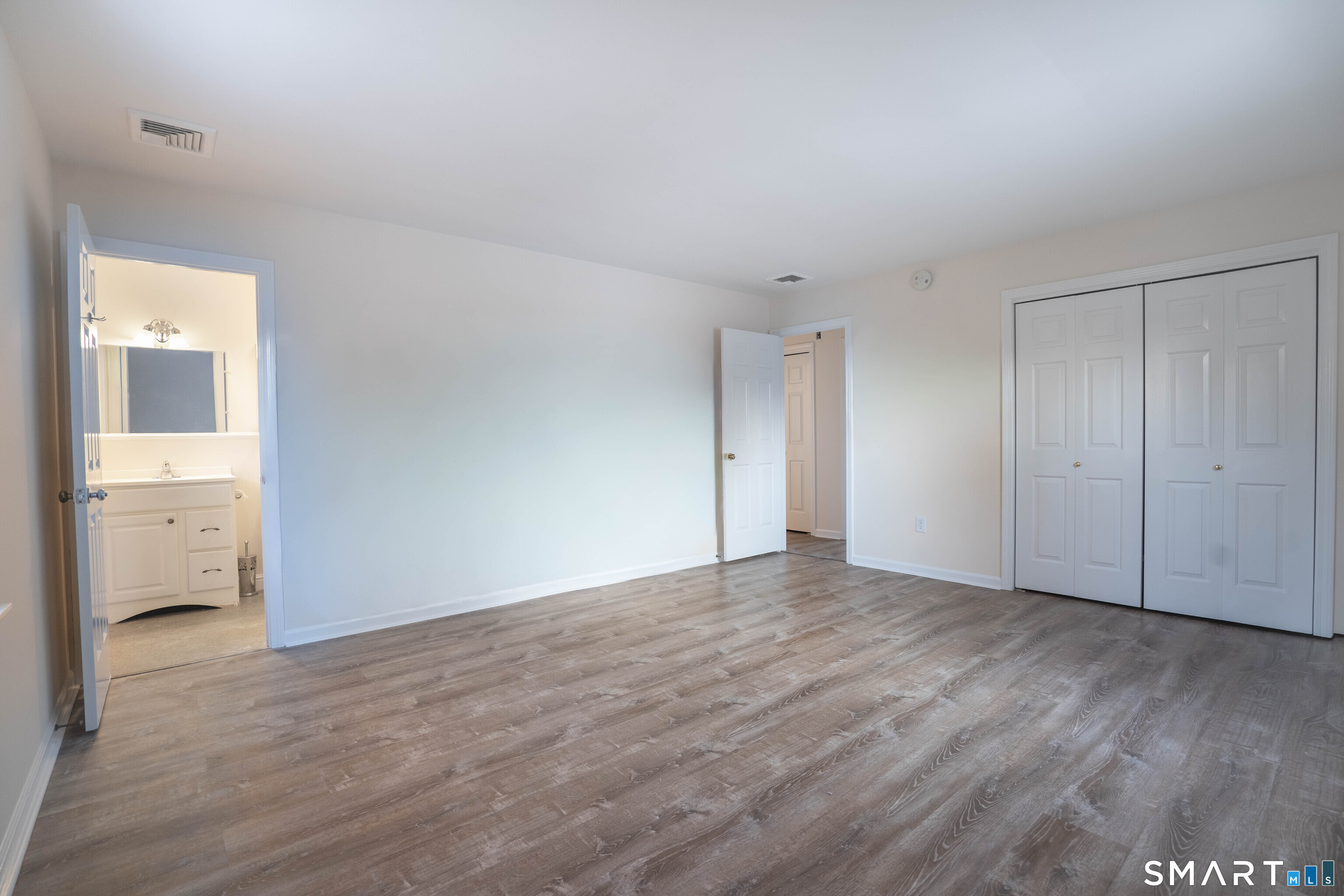 4 Currycross Road, Unit 4 Madison, CT 06443 - Photo 16 of 29 a view of an empty room and glass door
