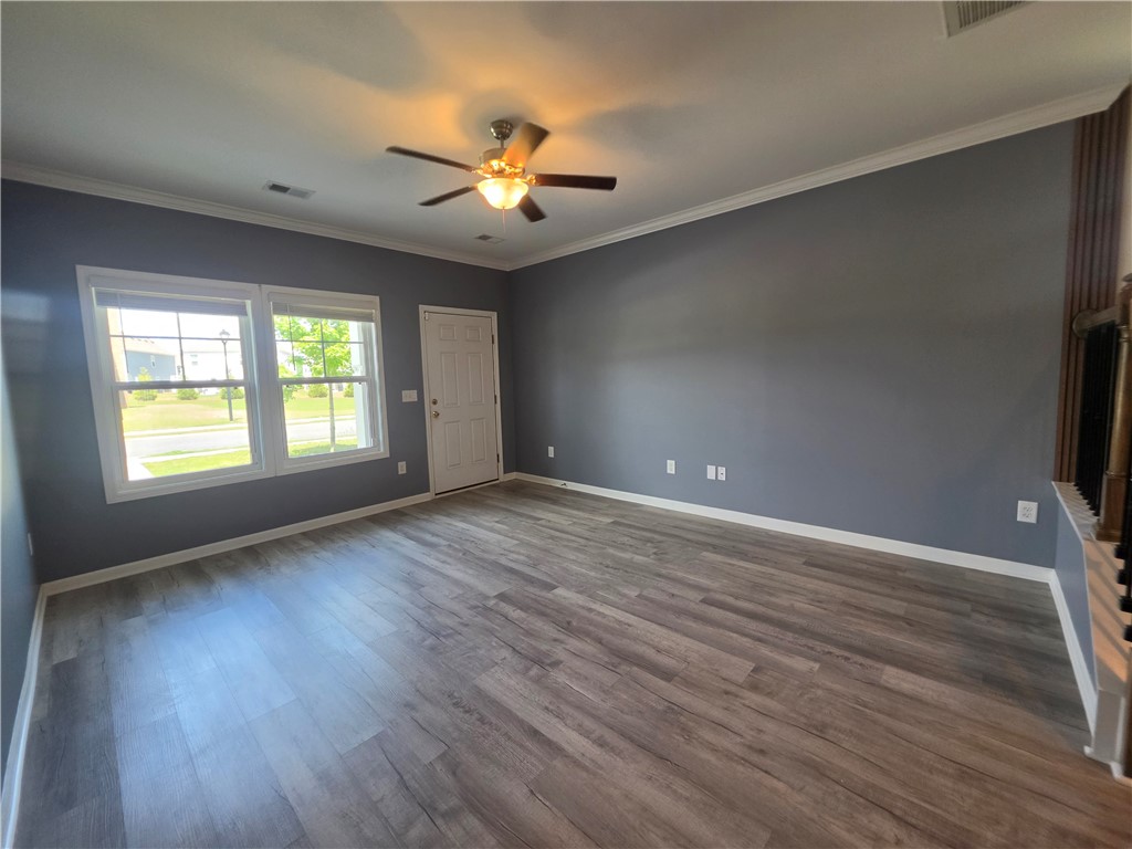 312 Phillips Drive Pendleton, SC 29670 - Photo 8 of 45 This inviting living space features durable flooring and ample natural light, creating a comfortable atmosphere.