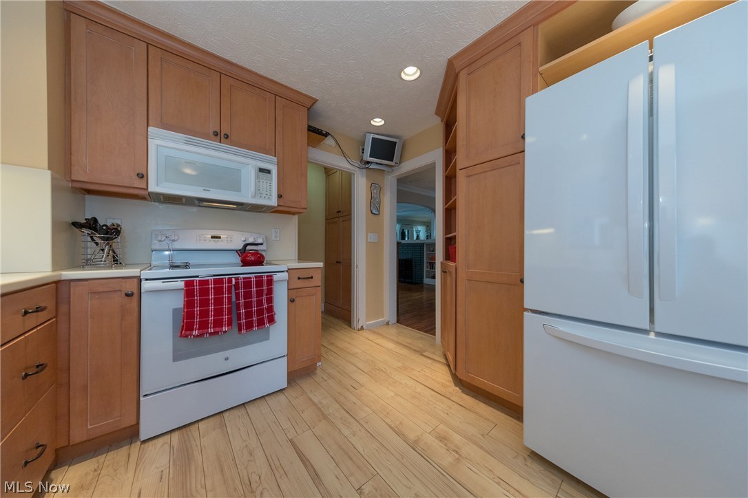 3996 Rosemond Road Cleveland Heights, OH 44121 - Photo 9 of 29 The Kitchen with newer white appliances and plenty of cabinets for all your storage needs