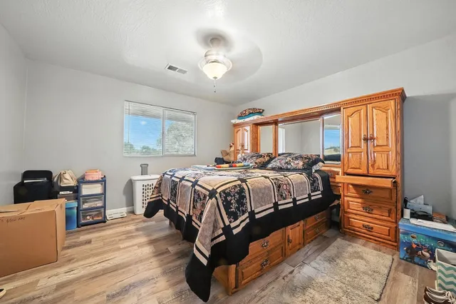 a large kitchen with a table and chairs