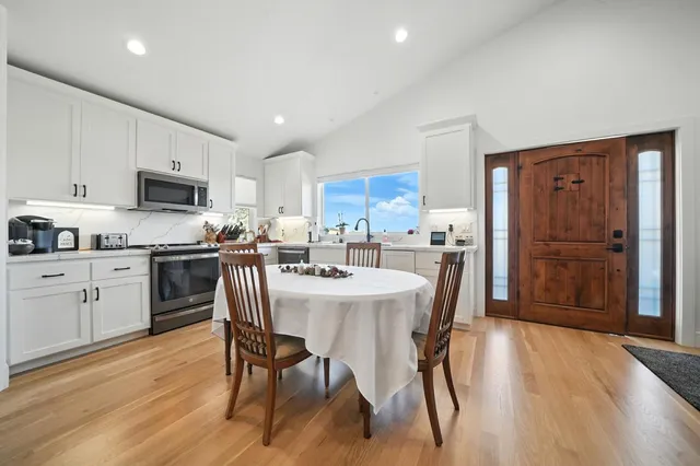 an aerial view of house with yard