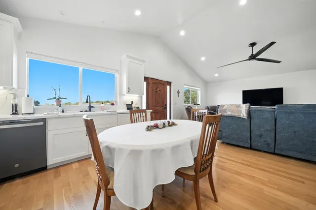 a view of grassy field with trees