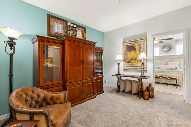 a livingroom with furniture and a window