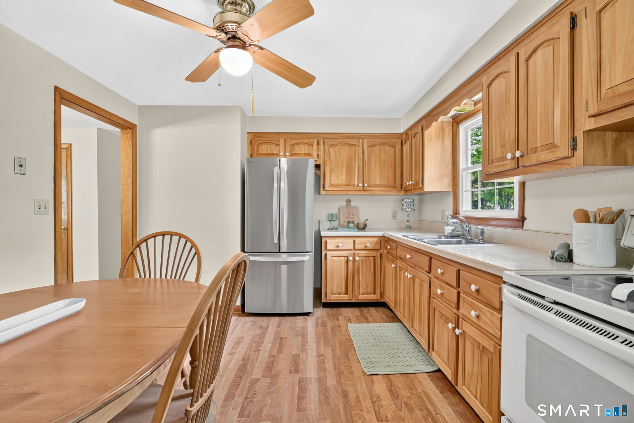 296 Phoenix Street Vernon, CT 06066 - Photo 11 of 34 a kitchen with sink cabinets and window