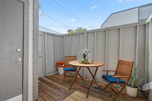 a view of a livingroom with furniture and a chair