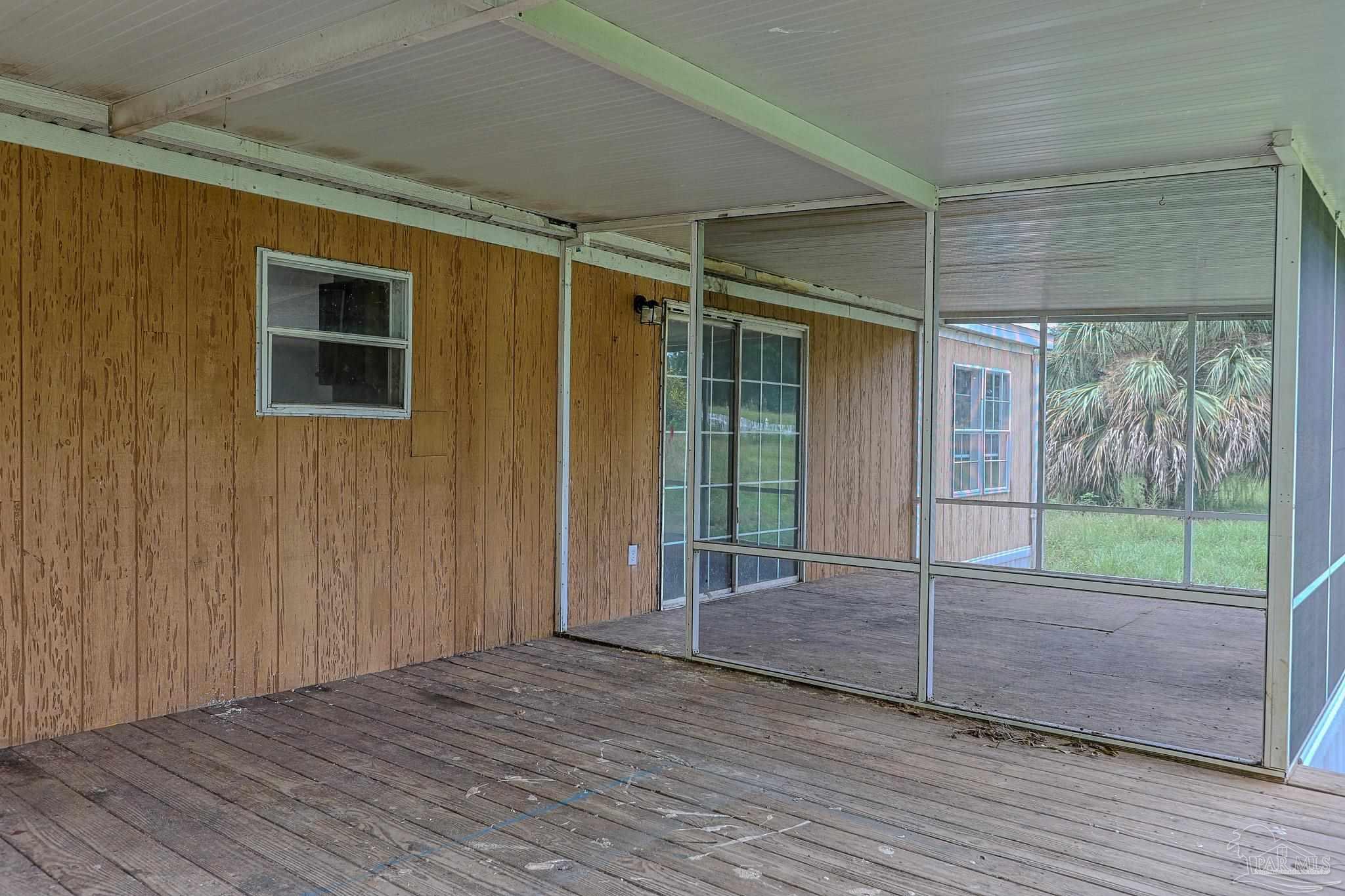 6850 Bratt Road Century, FL 32535 - Photo 51 of 57 a view of outdoor space and wooden deck