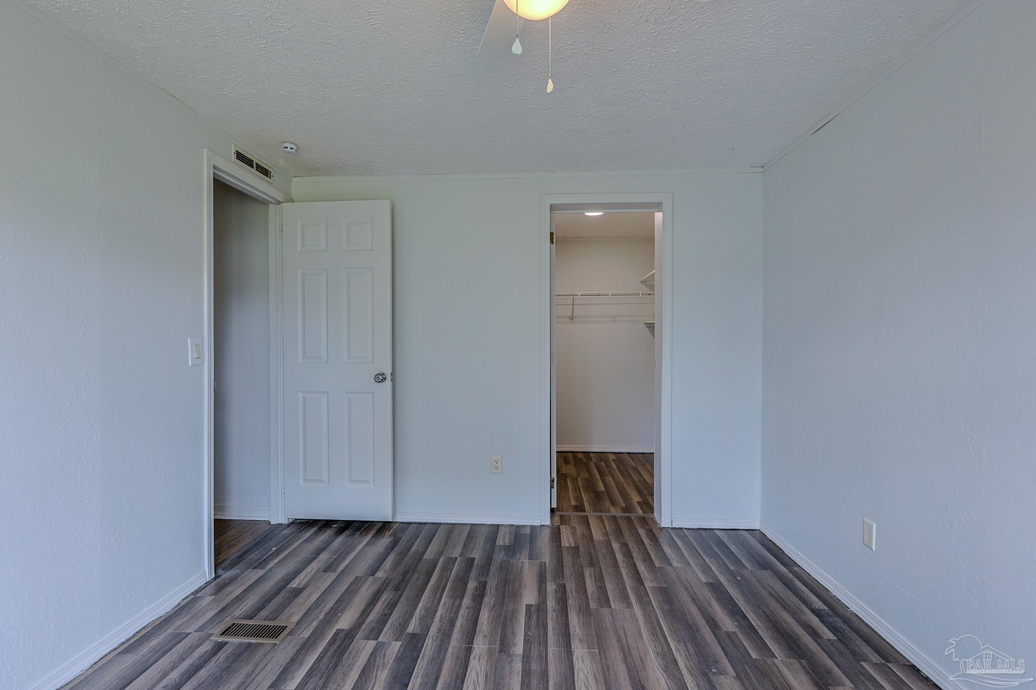 6850 Bratt Road Century, FL 32535 - Photo 9 of 57 a view of wooden floor