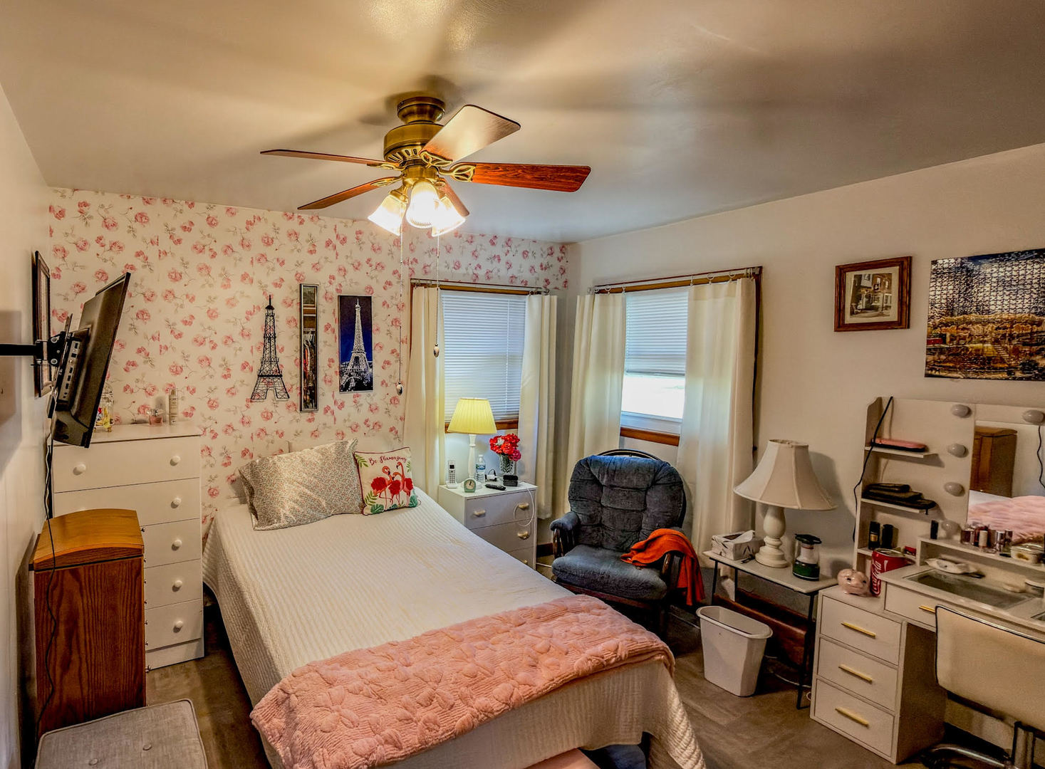 1116 Eastview Drive Paxton, IL 60957 - Photo 11 of 15 a bedroom with bed a flat tv screen and a dresser