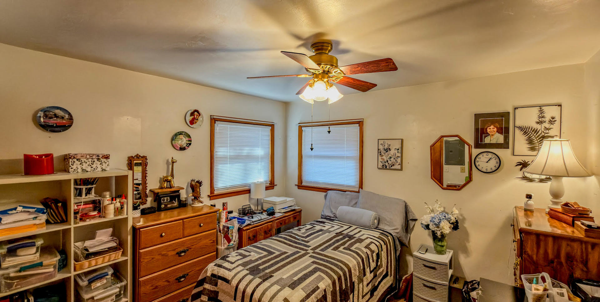 1116 Eastview Drive Paxton, IL 60957 - Photo 8 of 15 a bedroom with a bed and a chandelier