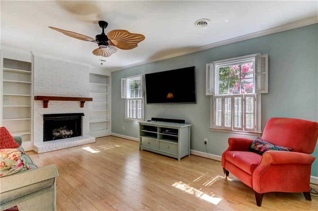 4932 Tower Road, Unit A Greensboro, NC 27410 - Photo 9 of 24 Living Room and Gas Log Fire Place with Built in Shelves