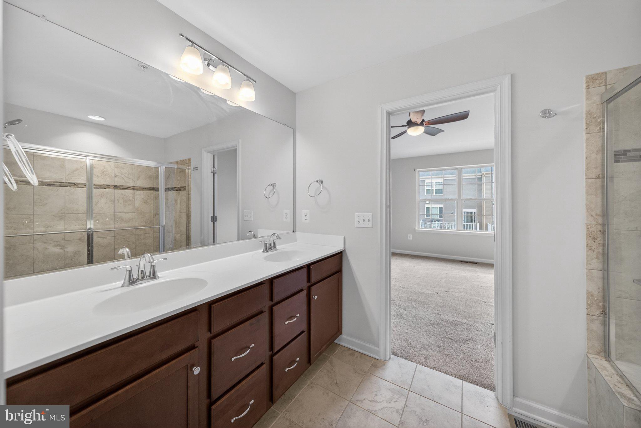 8475 Randell Ridge Road Frederick, MD 21704 - Photo 23 of 36 Modern bathroom with natural light.