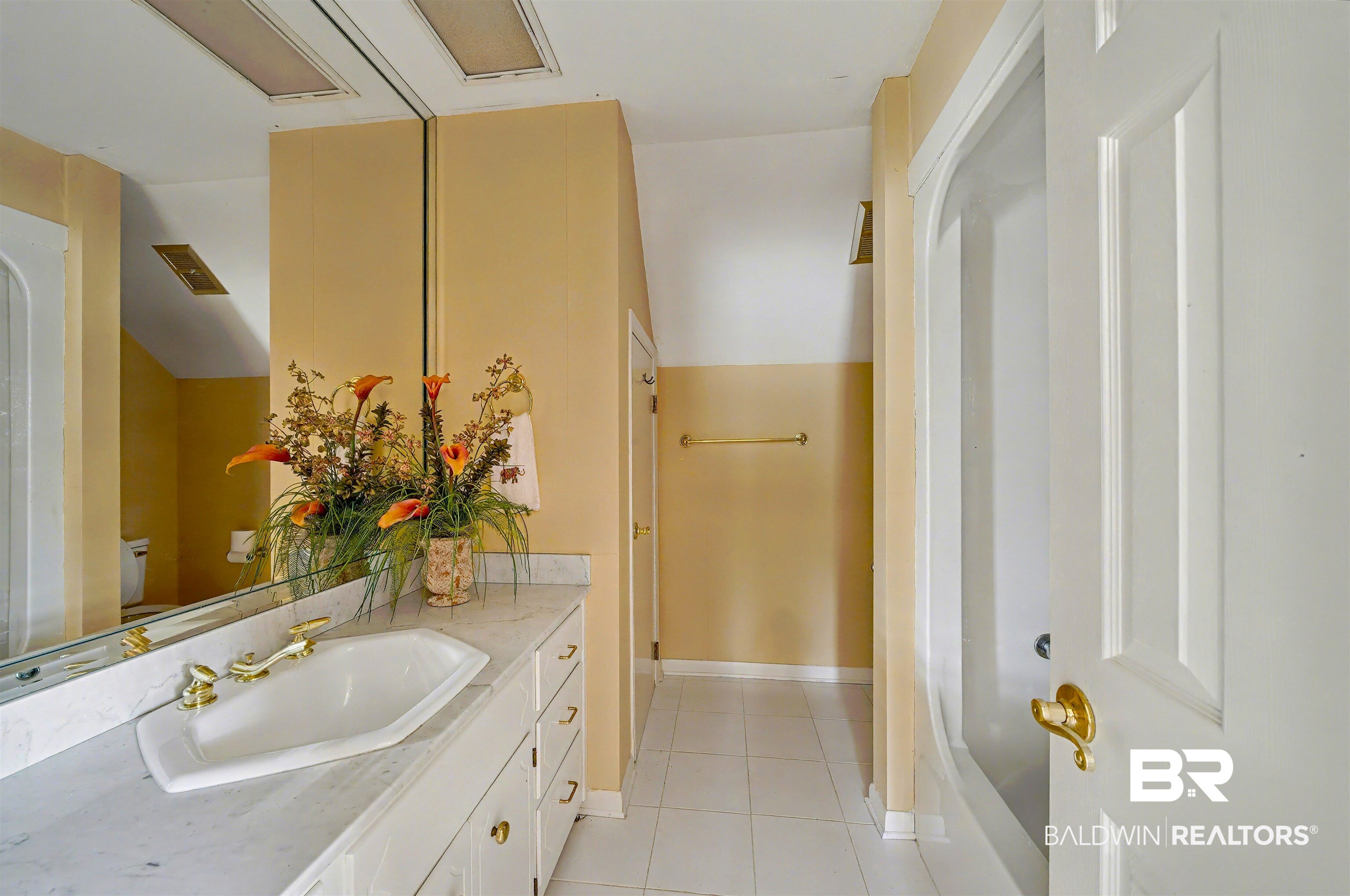 15810 County Road 73 Foley, AL 36535 - Photo 34 of 56 Full bathroom with light tile patterned floors and vanity