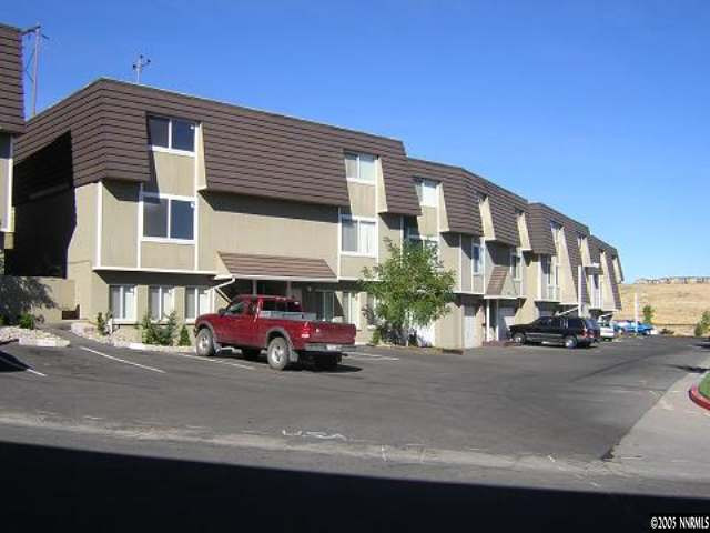 3990 Covington Way, Unit A Reno, NV 89503 - Photo 3 of 9 a car parked in front of a building
