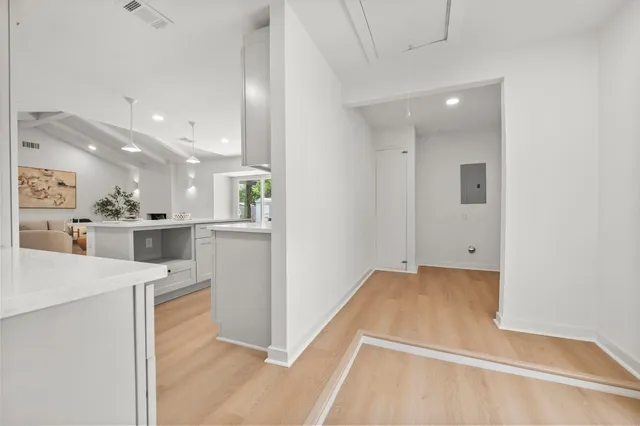 a view of a kitchen with a sink