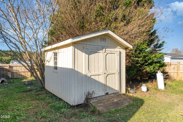 a view of backyard of house