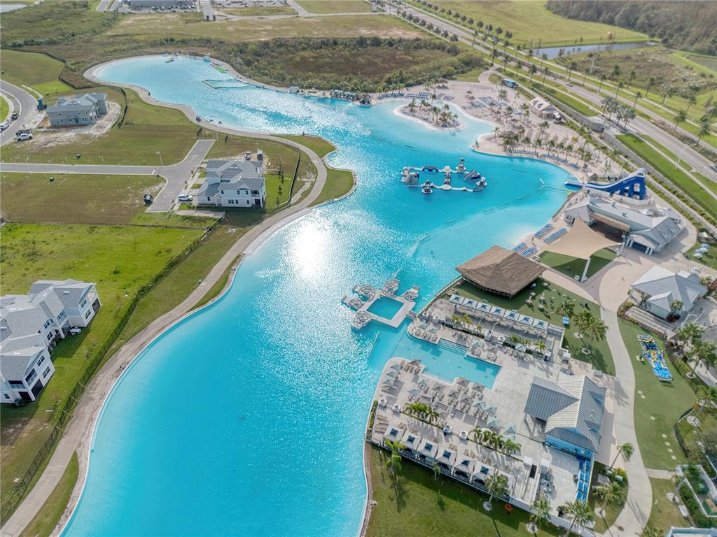 8309 Hardy Bay Loop Wesley Chapel, FL 33545 - Photo 13 of 24 an aerial view of a house with a yard