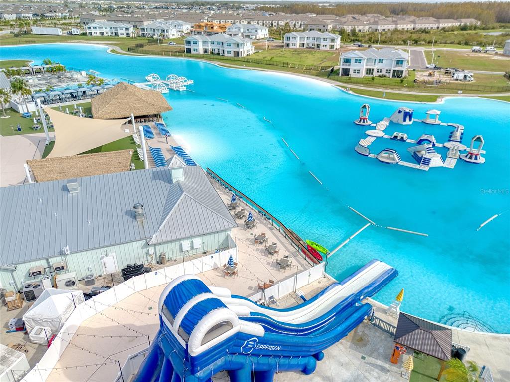 8309 Hardy Bay Loop Wesley Chapel, FL 33545 - Photo 20 of 24 a view of a chairs and table in a terrace