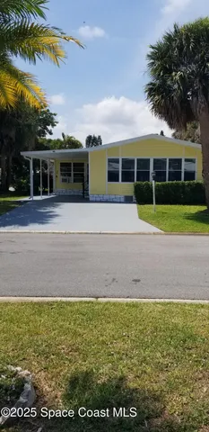 $254,000 | 843 Sapodilla Drive, Barefoot Bay, FL 32976