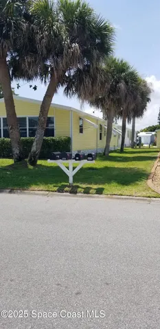 $254,000 | 843 Sapodilla Drive, Barefoot Bay, FL 32976